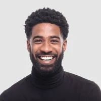 Portrait photo of a smiling professional representing a small business owner